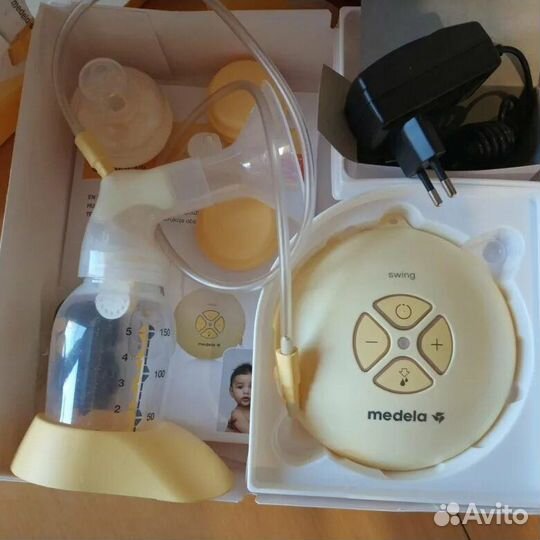 Молокоотсос medela электрический
