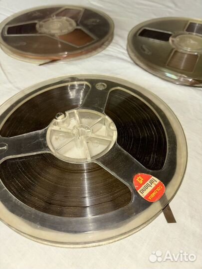 Катушки с записями и магнитофон