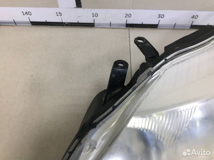 Фара левая Toyota Corolla E150 2006-2013