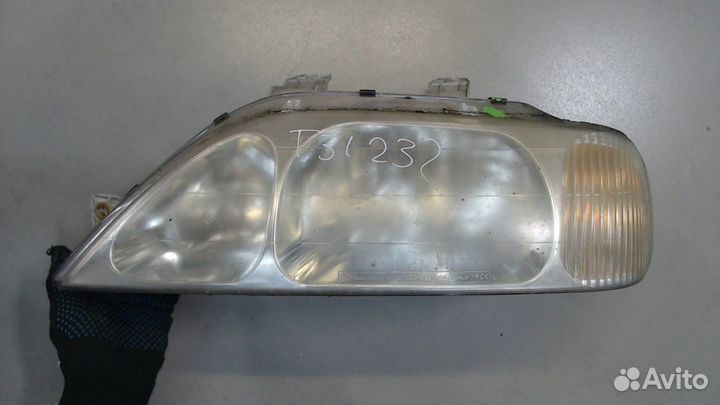 Фара (передняя) SsangYong Musso, 2002