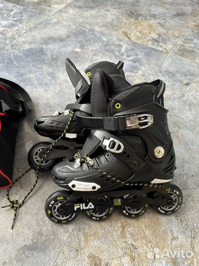 Роликовые коньки