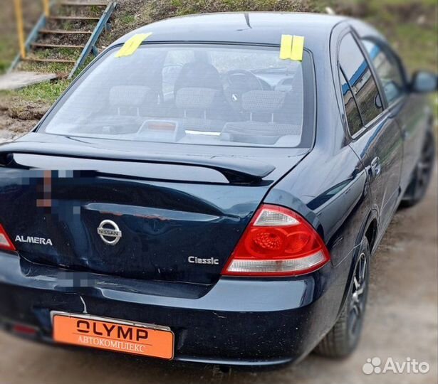 Стекло заднее Nissan Almera N16 2000-2012