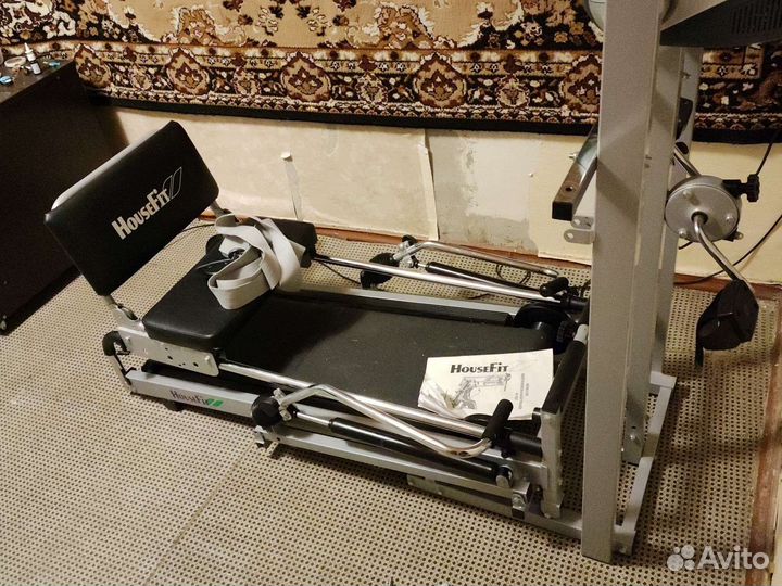 Гребной тренажер