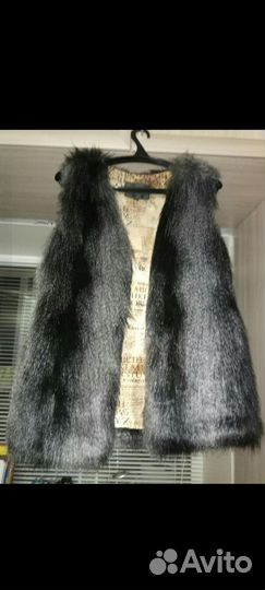 Меховая жилетка