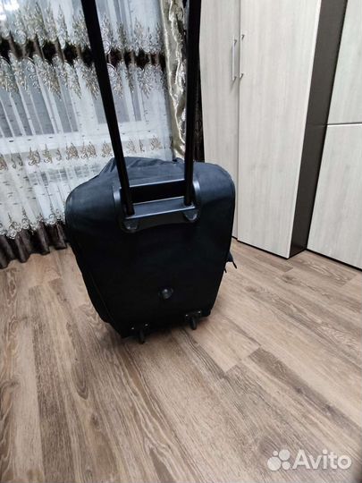 Сумка дорожная на колесах с выдвижной ручкой