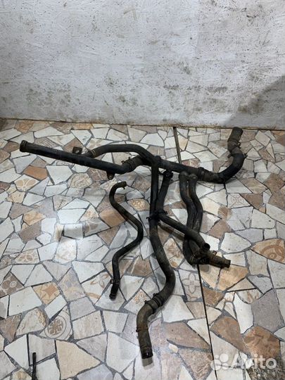 Патрубок системы охлаждения Renault Logan седан