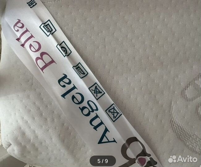 Детская кроватка с маятником белая