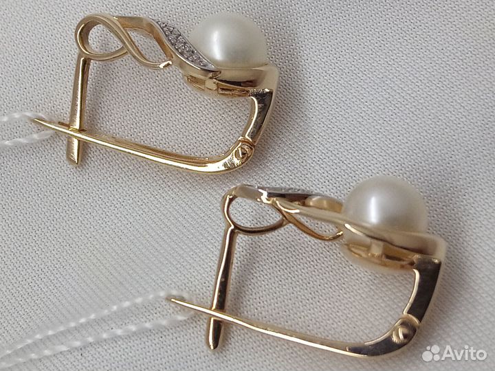 Золотые серьги с камнем