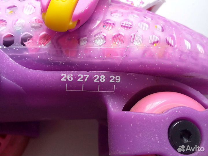 Роликовые коньки