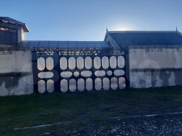 Дом 405,8 м² на участке 17,6 сот.