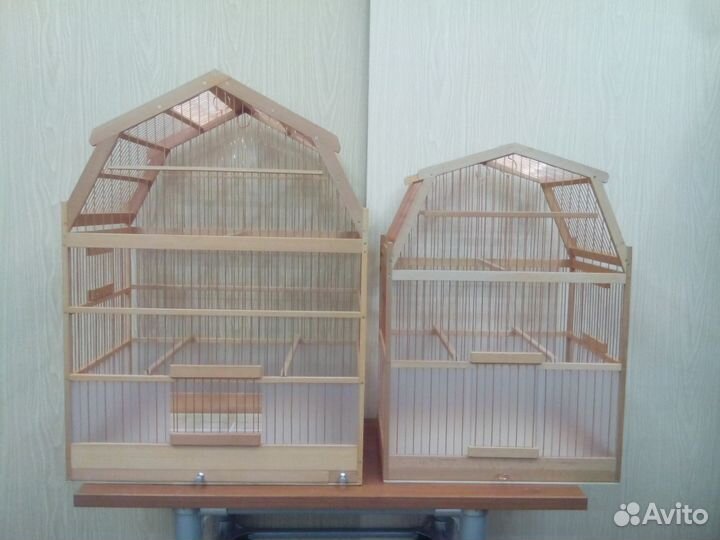 Клетки для птиц из дерева разные