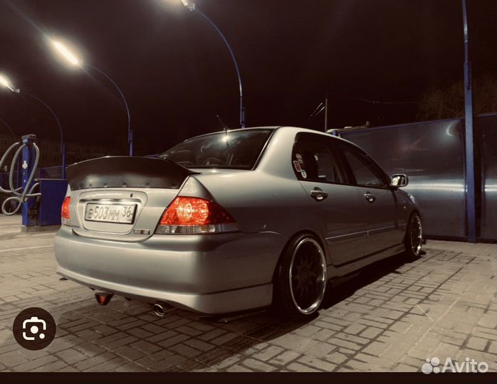 Спойлер lancer 9