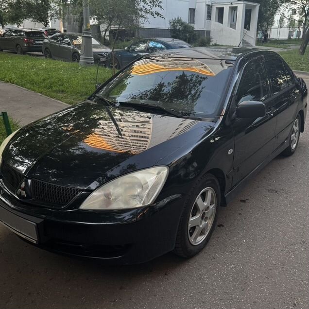 Mitsubishi Lancer 1.6 AT, 2005, 210 500 км