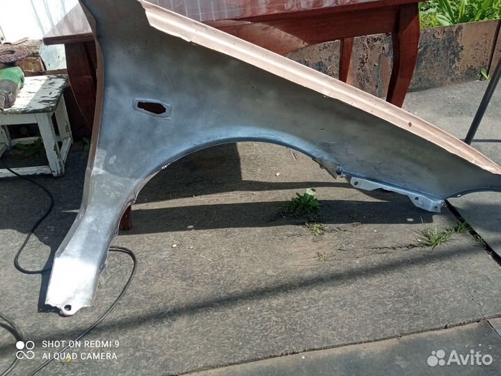 Крыло переднее левое