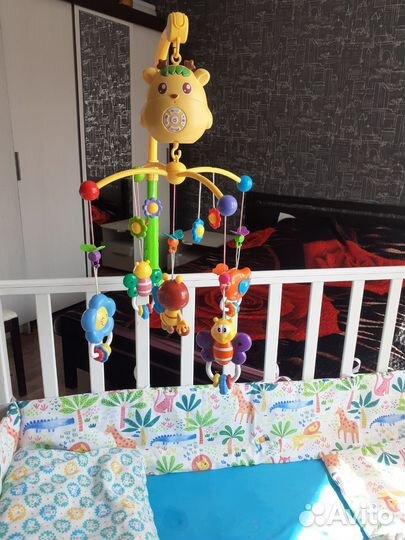 Детский мобиль в кроватку музыкальный