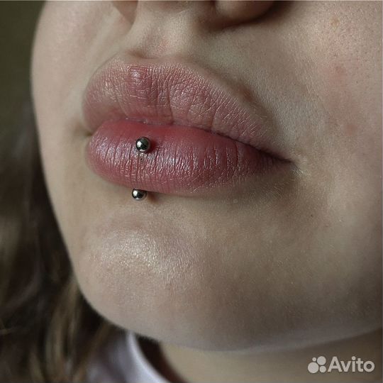 Мастер по пирсингу