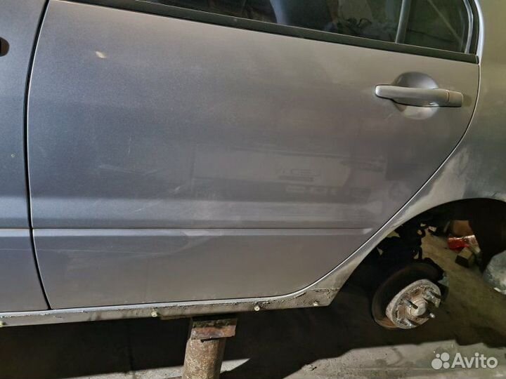 Дверь боковая задняя левая Mitsubishi Lancer 9