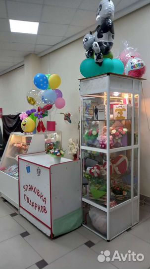 Островок упаковки подарков.Торг