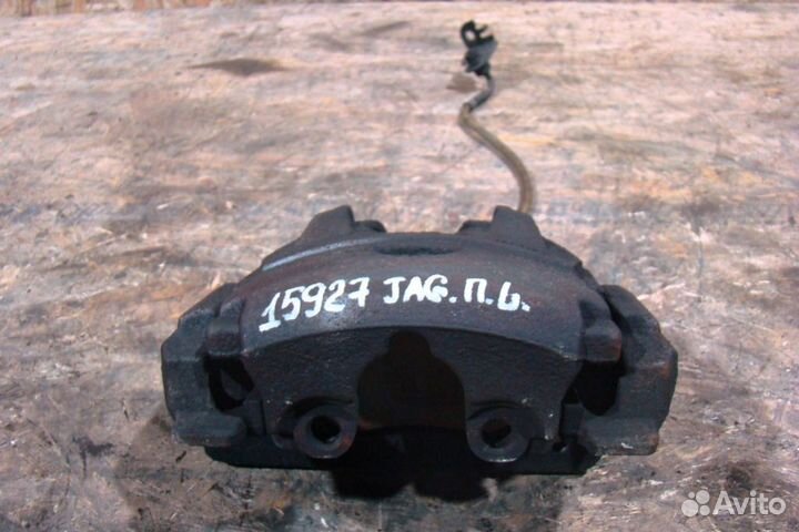 Jaguar XF Суппорт тормозной передний левый
