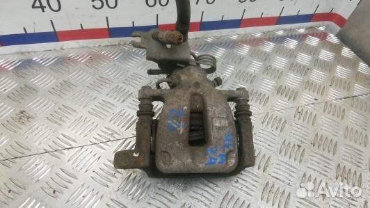 Суппорт тормозной задний левый volkswagen caddy 3