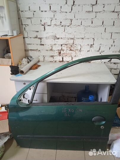 Дверь передняя Peugeot 206