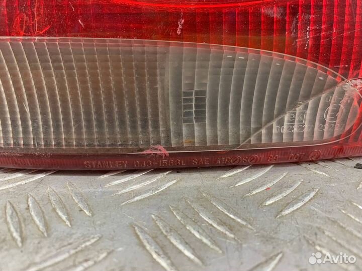 Фонарь левый Митсубиши Мираж 1993