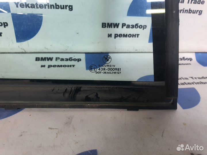 Стекло двери неподвижное правое заднее BMW e39