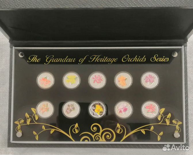 Серебряные иностранные монеты цветы