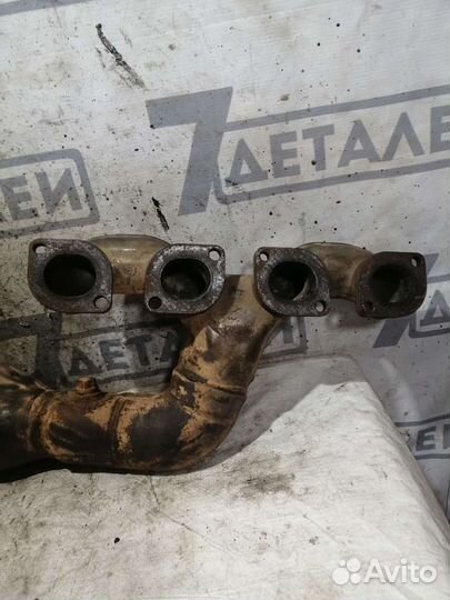 Коллектор выпускной левый Bmw 7 E65