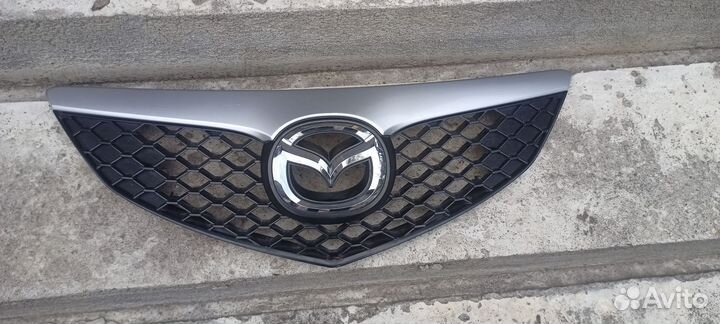 Решетка капота mazda 3