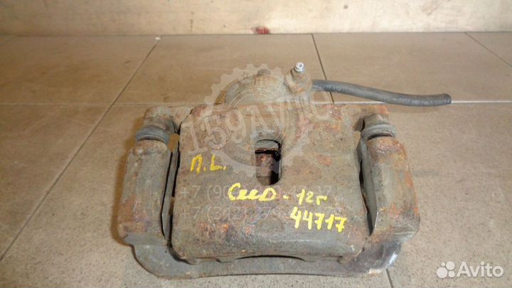 Суппорт передний левый Kia Ceed 2 (JD)