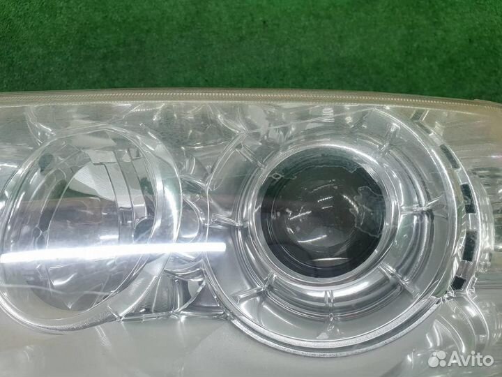 Фара левая Mitsubishi Pajero Sport 2 (2008-2016) галоген
