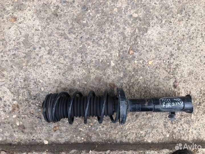 Стойка амортизатора передняя правая Honda Civic 8