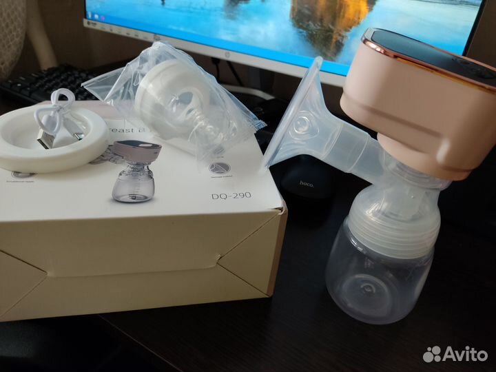 Молокоотсос электрический новый