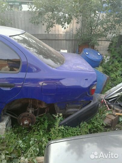 Крышка багажника на ниссан примера