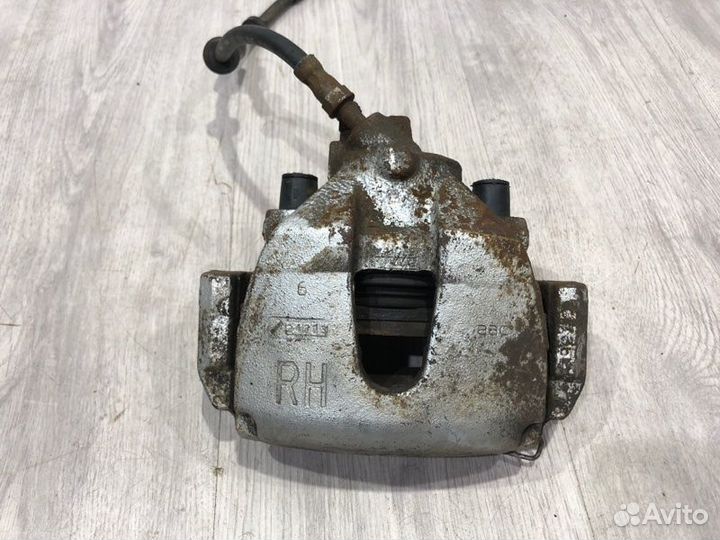 Суппорт тормозной передний правый Ford Focus 2