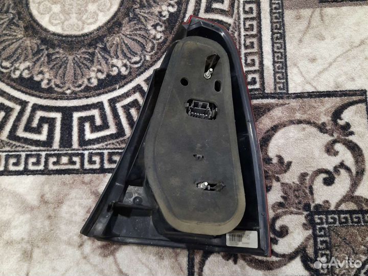 Фонарь задний левый на renault logan 1