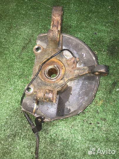 Кулак передний правый Mitsubishi Lancer X CY4A