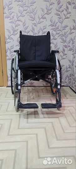 Инвалидная коляска