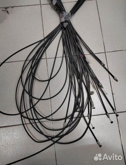 Трос лючка бензобака Mitsubishi Pajero Sport