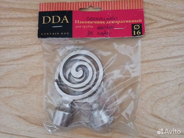 Декоративный наконечник для карниза