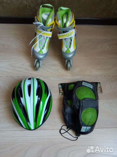 Роликовые коньки женские раздвижные с защитой