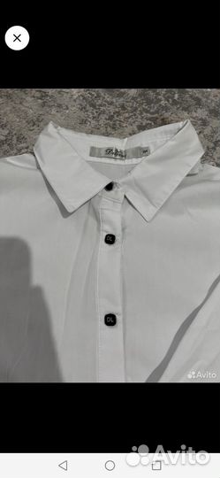 Продам красивую блузку на девочку Deloras