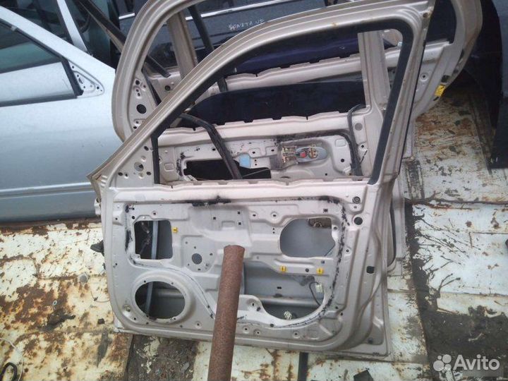 Дверь Kia Clarus