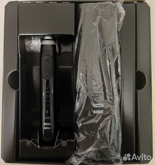 Электронная зубная щетка орал би