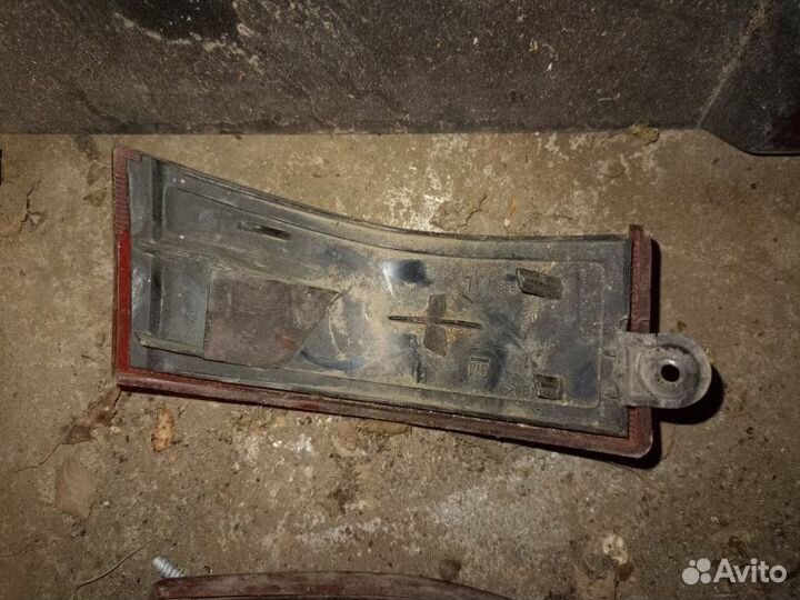 Отражатель в бампер задний Opel Omega универсал