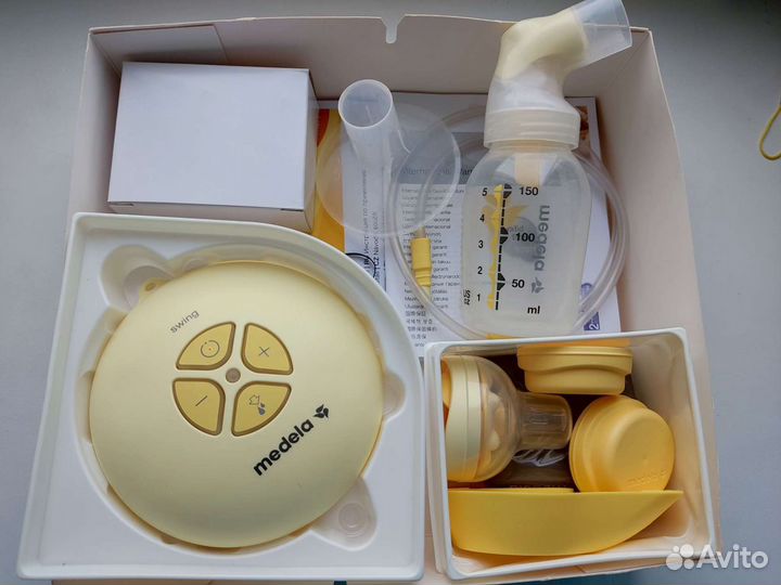 Молокоотсос medela электрический