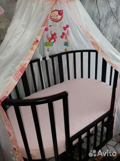 Детская кроватка трансформер с маятником