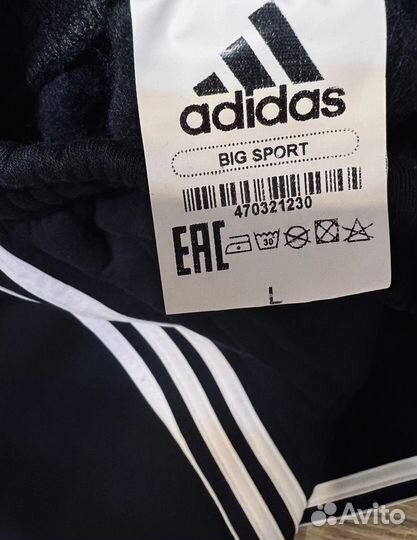 Новые теплые брюки Adidas на флисе,на манжете