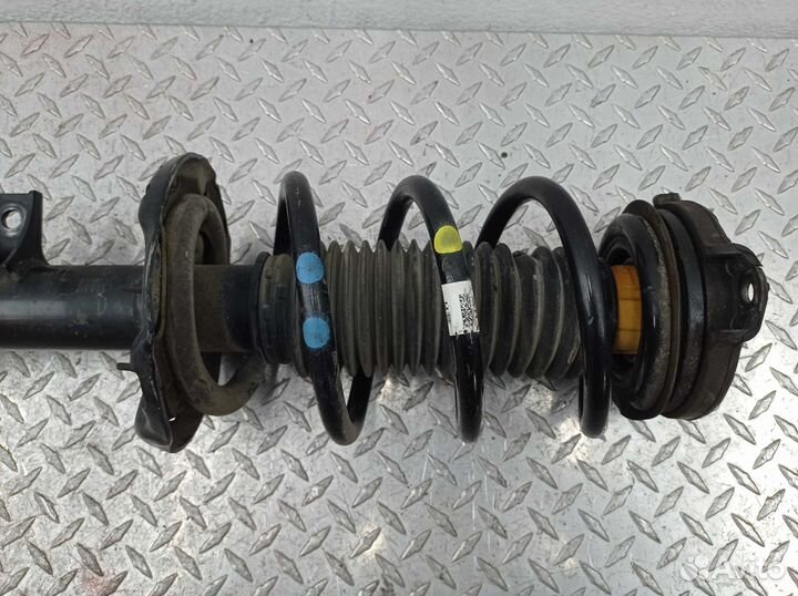 Амортизатор передний L Kia Sportage 4 QL